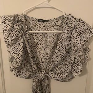 Polka dot white and black wrap blouse